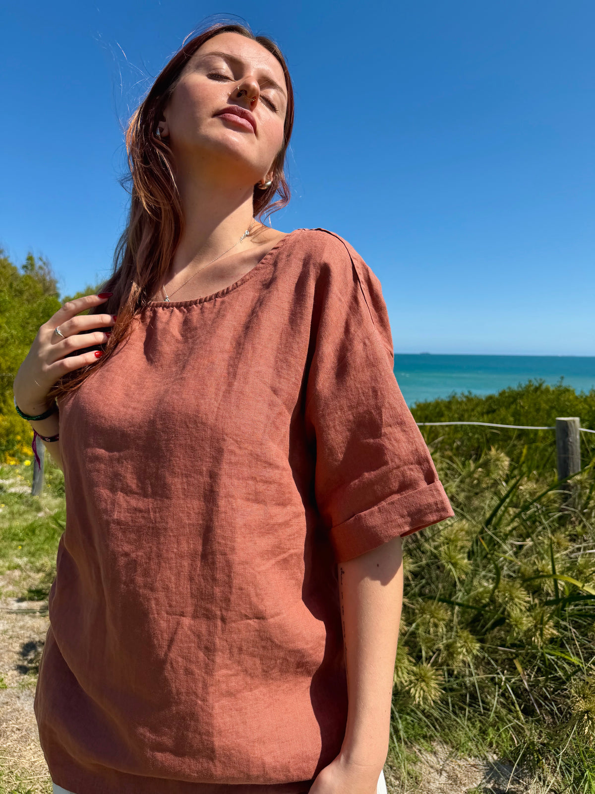 Rust boxy tee with crew neck and short sleeves, slightly dropped shoulder fit.