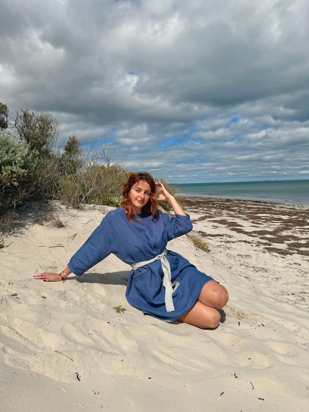 Denim blue tee tunic dress with tie belt, wide neckline and 3/4 sleeves