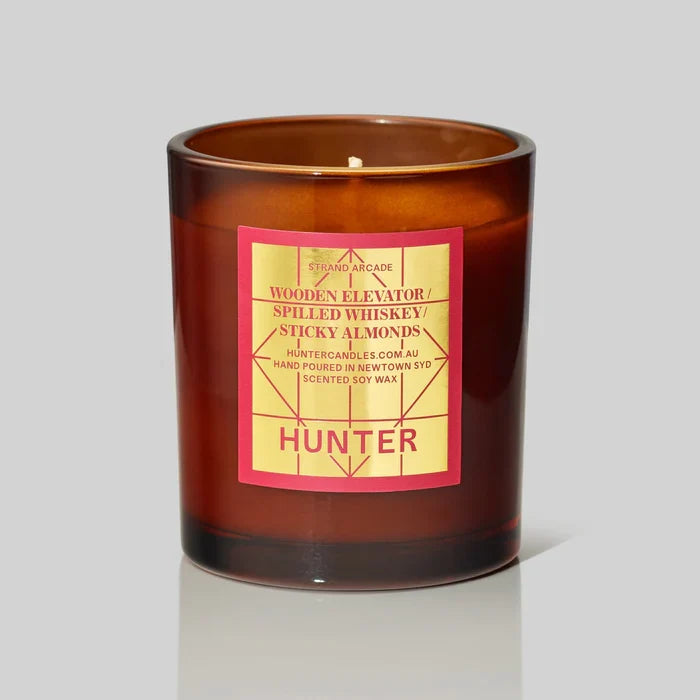 HUNTER CANDLE - STRAND ARCADE: Wooden Elevator, Spilled Whiskey, Sticky Almonds